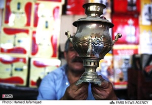 کارگاه تعمیر سماور در میدان بهارستان