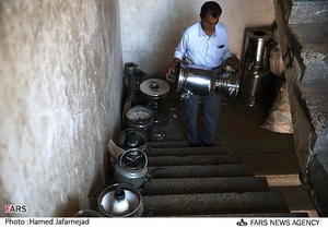 کارگاه تعمیر سماور در میدان بهارستان