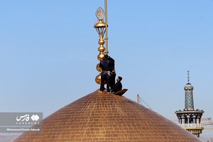 آئین تعویض پرچم گنبد و پوش ضریح حرم مطهر رضوی