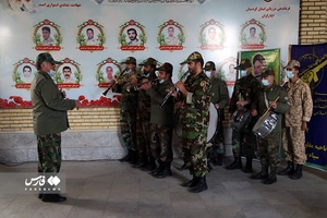 غبارروبی وعطرافشانی گلزار شهدا 