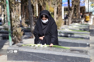 غبارروبی وعطرافشانی گلزار شهدا 