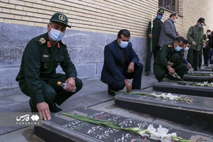 غبارروبی وعطرافشانی گلزار شهدا 